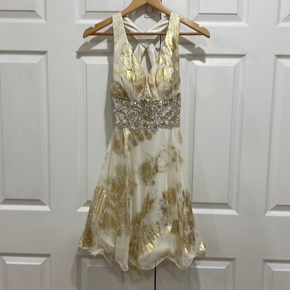 White and gold dress by Camille La Vie